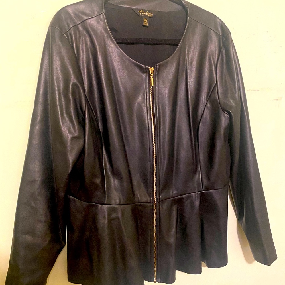 Black faux leather blazer with peplum detail and gold zipper.
